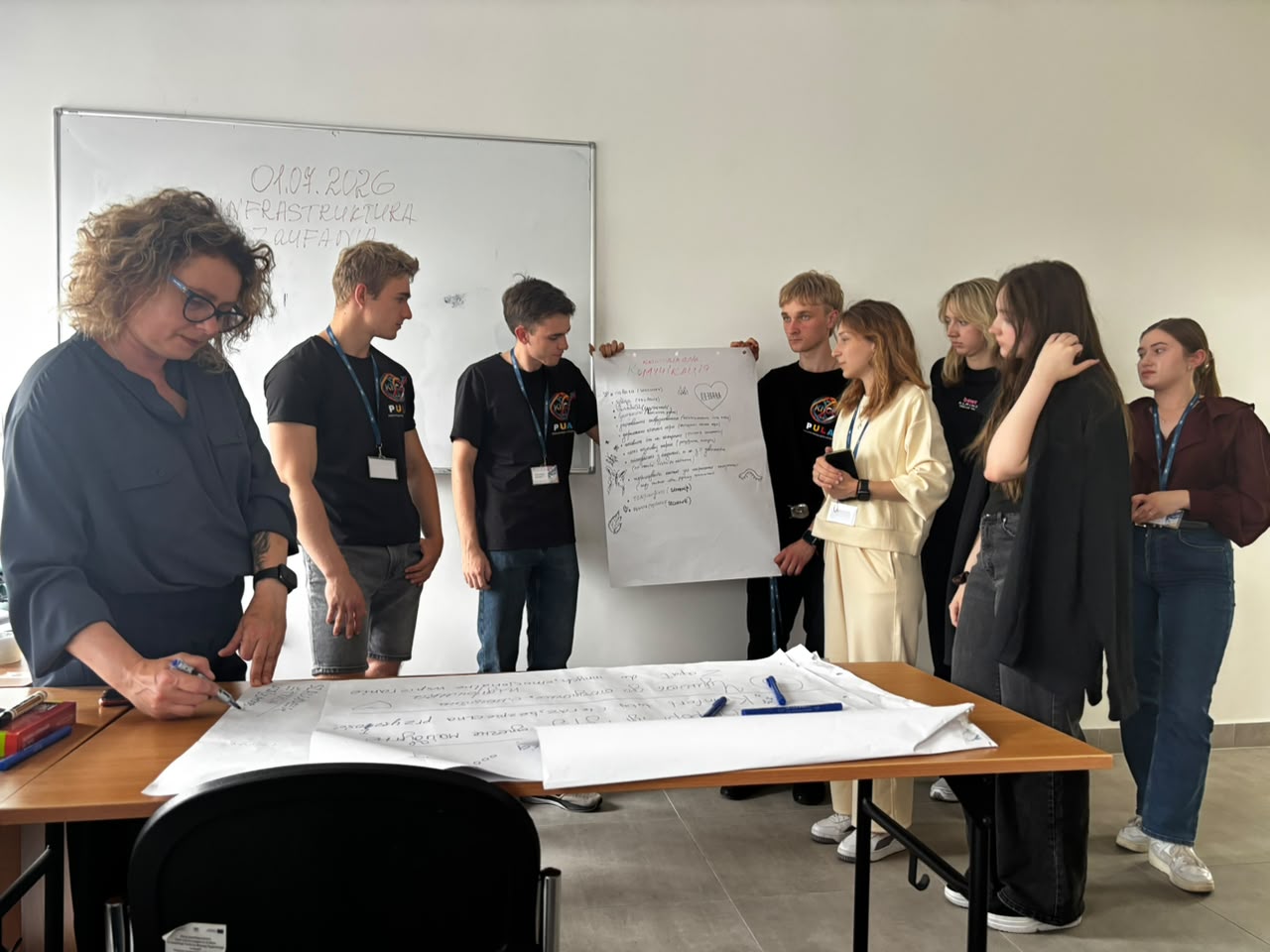 Photo of PULA project participants presenting their work at Bristol board
